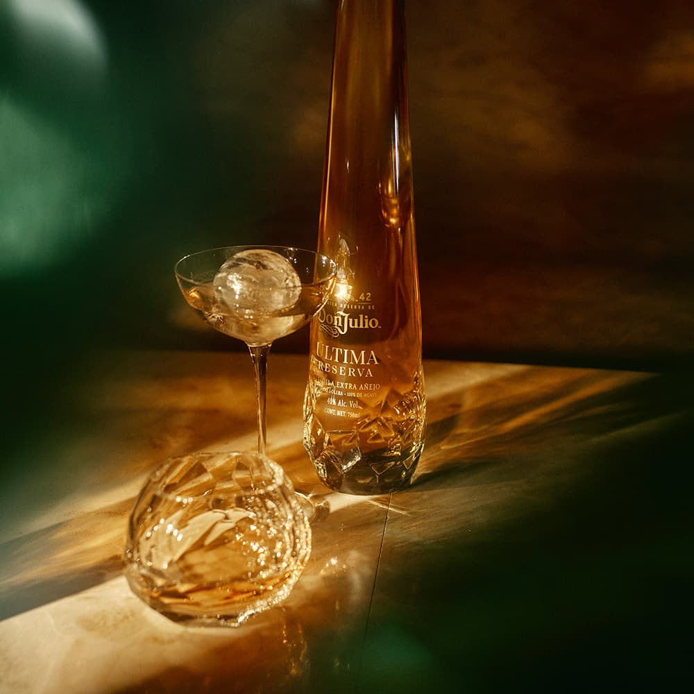 Don Julio Bottle lifestyle bottle shot with cocktail glass