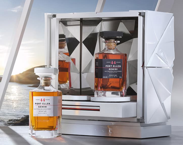 Port Ellen Gemini​ with decorative packaging beside a window overlooking the coast