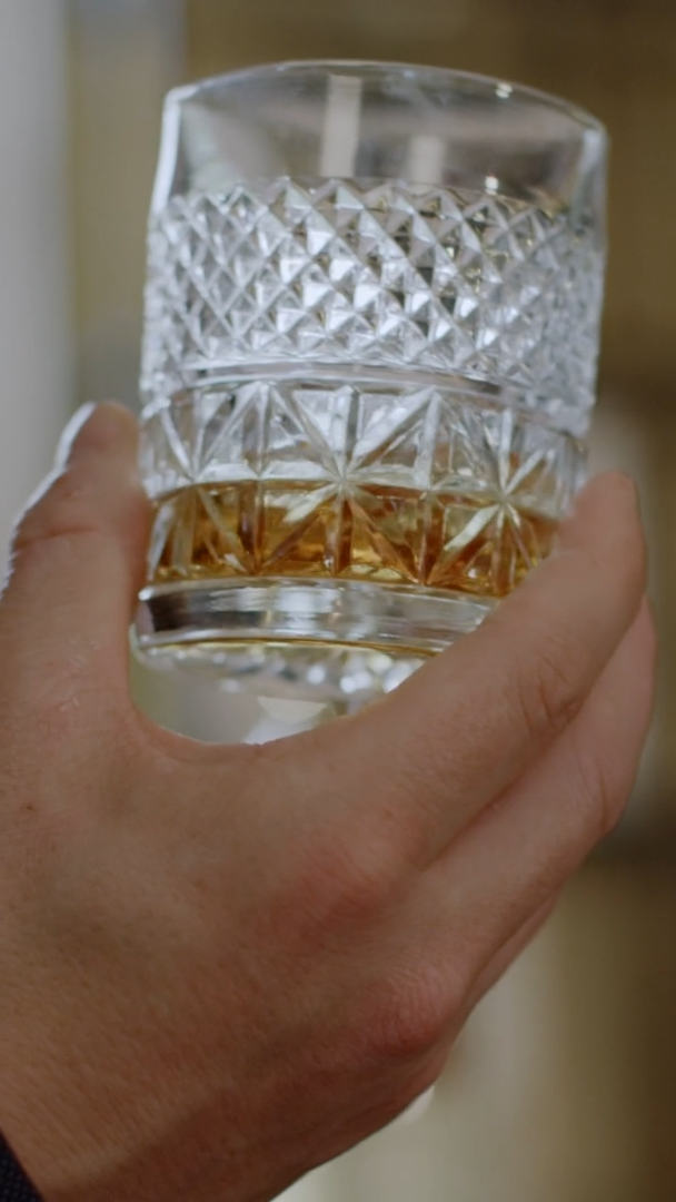 Lagavulin 2020 bottle and neat serve on top of a drinks trolley