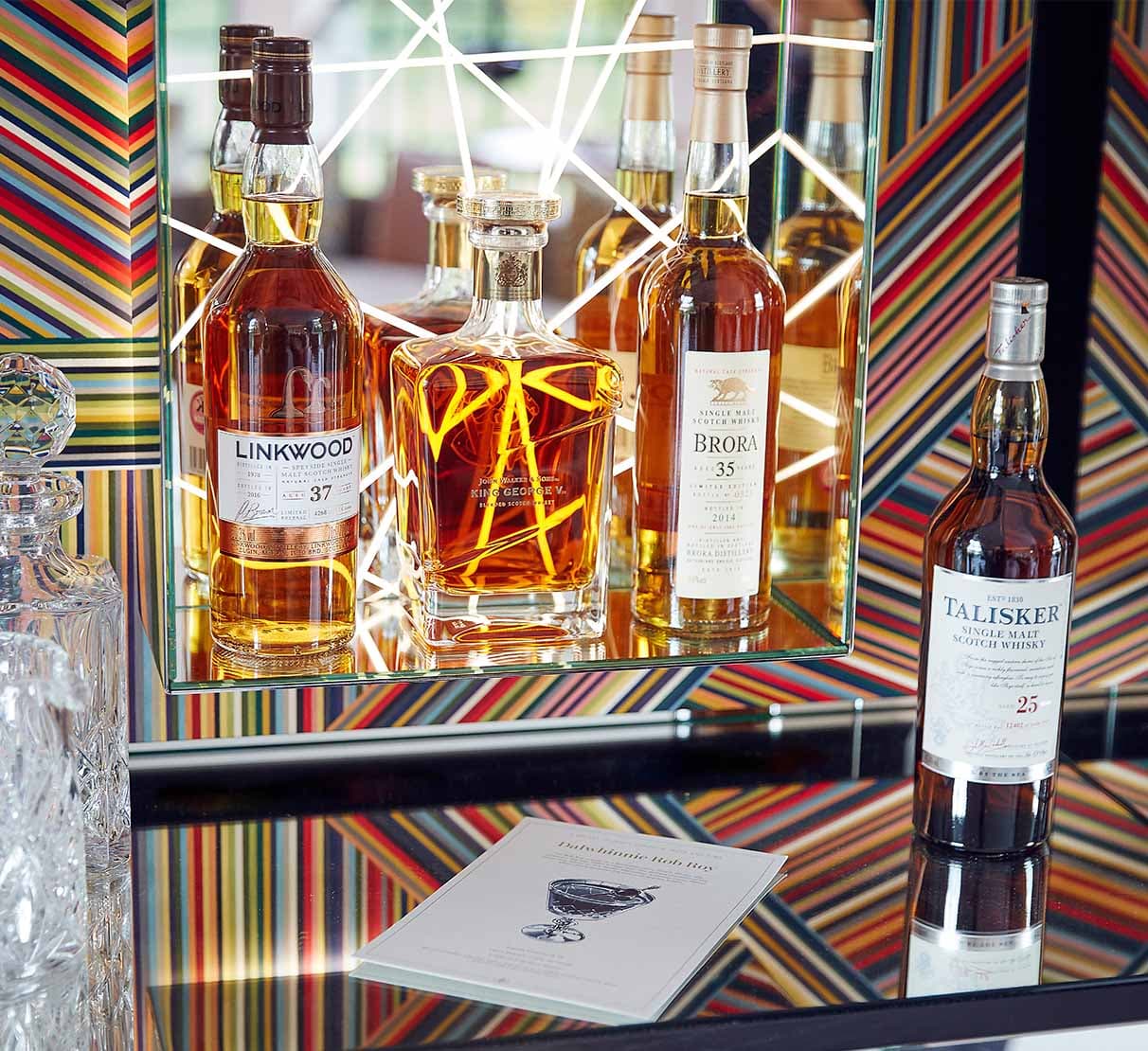 Rare Whisky Bottles on a glass table