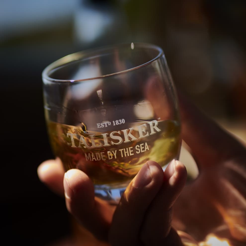 a close up image of Talisker 44 Year  Old Forests of the deep in a branded whisky glass