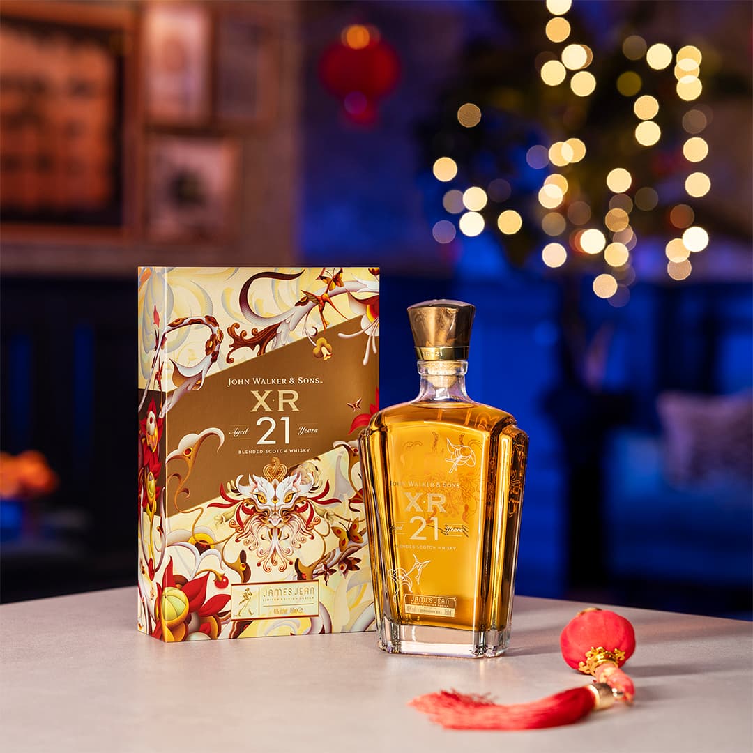 A Johnnie Walker & Sons XR21 Lunar New Year Limited Edition Design with the box to the side