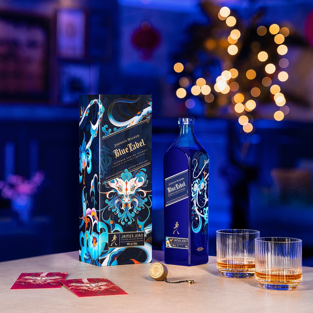 A bottle of Johnnie Walker Lunar New Year 2024 with its box on the side