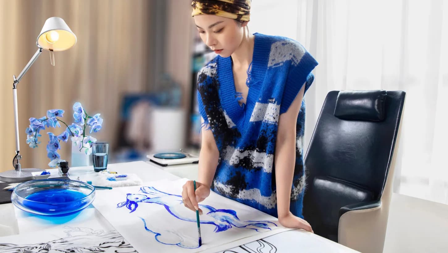 Angel Chen pictured in her studio creating the  Illustrations featured on the Johnnie Walker Lunar New Year  limited edition collection of bottles and packaging